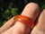 Photo 1 Red Agate ring around finger