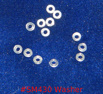 Washer, clear plastic, ID (Inside hole) 1.4mm, OD (outside diameter) 3mm, thickness .5mm
sold in 100 count packages. Application separate  head of screw from the lens or other part.