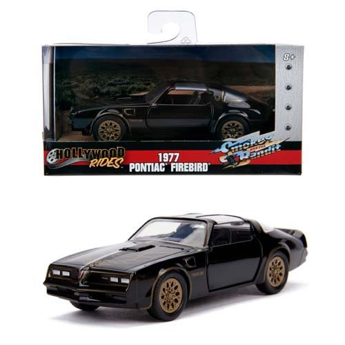 Jada Toys, Inc - 1:32 Scale Diecast - Hollywood Rides - Smokey & The Bandit - 1977 Pontiac Firebird - 24 Pack