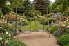 Ornate Metal Garden Swing – Decorative Two‑Seat Outdoor Swing