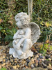 Stone Cast Cherub Ornament with Teddy in Hand