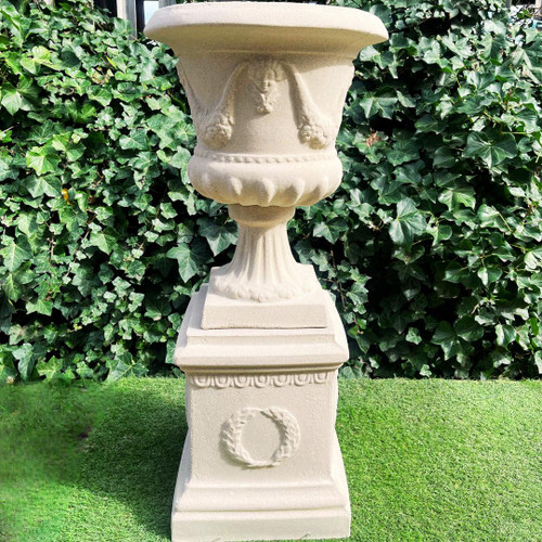 Large Sandstone Fluted Urn and Column with Laurel Wreaths Large Sandstone Fluted Urn and Column with Laurel Wreaths