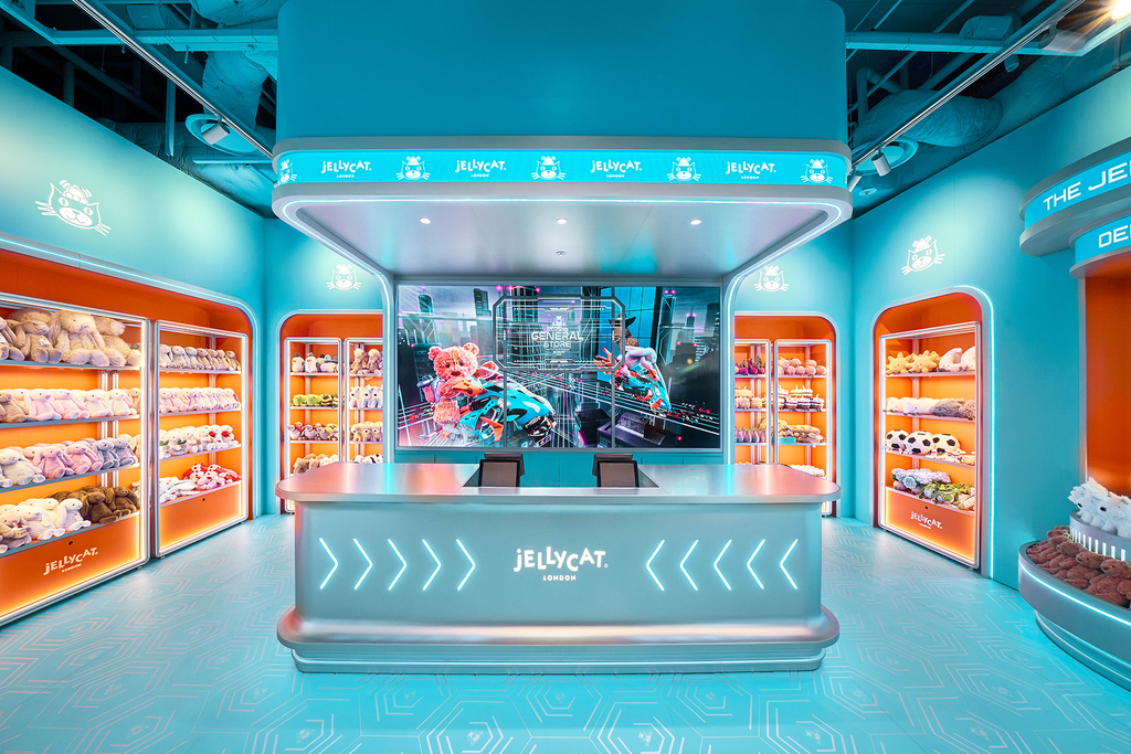 Jellycat Hyundai General Store interior shows turquoise counters, orange shelving, and plush displays under bright lighting.