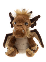 A brown dragon Charlie Bear plush toy sits upright against a white background, featuring dark wings, clawed feet, expressive eyes, and a golden mane on its head.