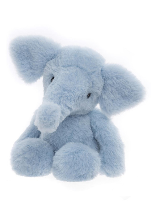 A soft, blue plush elephant teddy bear sits upright against a white background, with large floppy ears, a short trunk, and round paws.