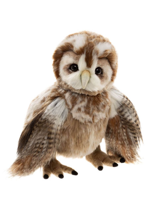 A barn owl stuffed animal stands facing forward against a white background, featuring realistic brown and white plush fur, spread wings, and black-tipped claws.