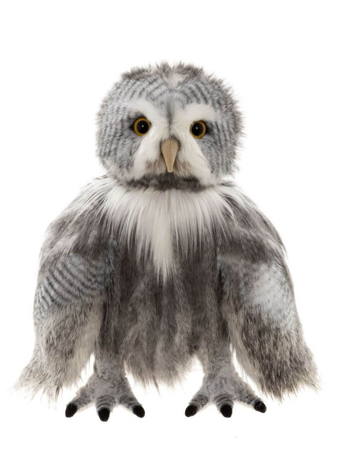 A grey and white plush owl teddy bear stands upright, facing forward, with amber eyes, striped feather detail, and black taloned feet, against a white background.