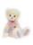 A pastel rainbow-coloured fluffy teddy bear sits upright against a white background, wearing a pink organza bow and small gold bell around its neck.