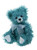 A teal/turquoise fluffy Charlie Bear teddy sits upright against a white background, wearing a shimmery silver-blue ribbon bow, with pale blue muzzle and paw pads.