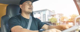 Driver in Comfortable Semi-Truck Seat