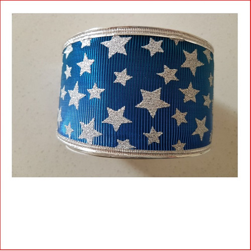 Christmas Ribbon  Blue and Silver Stars -65mm looks great with the final touch of the silver stars. Christmas Ribbon  Blue and Silver Stars -65mm is a ribbon that is used very frequently with our designer team decorating garlands, wreaths, christmas trees and wall sequoia's. Christmas Ribbon  Blue and Silver Stars -65mm are colours blue and silver that are just magical as blue and silver are the contemporary trend of this day and age.
