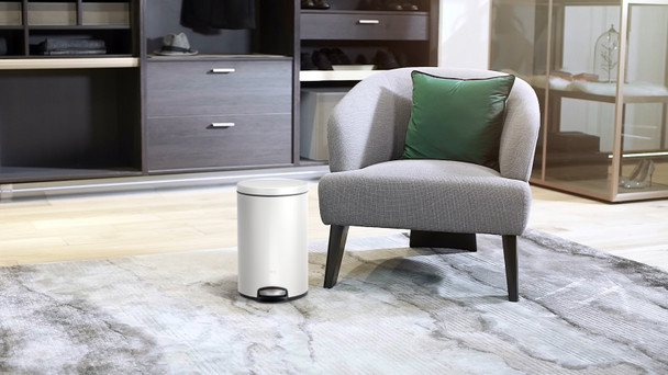 EK9115WH5 - EKO Eva Round Bathroom Pedal Bin - 5 Ltr - White - Placed next to armchair
