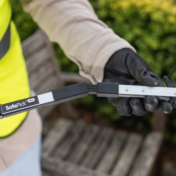 Person in Hi-Vis Vest & Wearing Gloves Puts Safe Pick Pro Folding Litter Picker into Straight Configuration