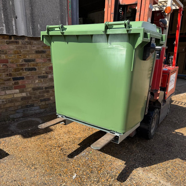 Static Forklift Waste & Recycling Bin - 660 Ltr - Green - Lifted on Forklift Facing Left