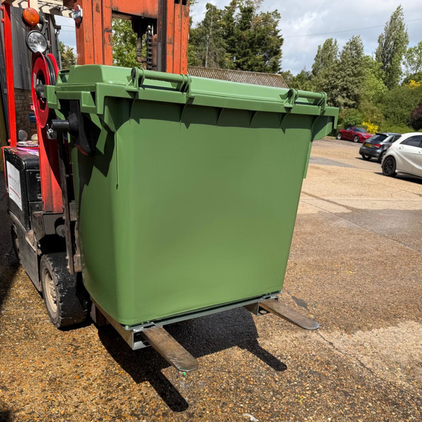 Static Forklift Waste & Recycling Bin - 660 Ltr - Green - Lifted on Forklift Facing Right
