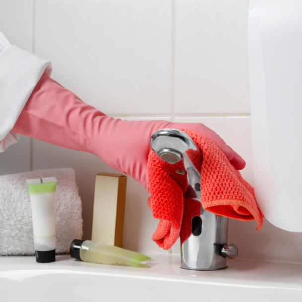 Spontex Red MF Pro Recycled Microfibre Cloth Being used to Clean a tap