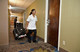 1902465 - Rubbermaid Quick Cart - Large - Being Pulled Towards Camera By Worker
