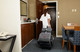 1902465 - Rubbermaid Quick Cart - Large - Being Pulled by Worker