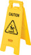 FG611200YEL - Rubbermaid 2-Sided Multilingual "Caution Wet Floor" Sign - Yellow