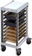 UGNPR11H9480 - Gastronorm pan trolley holding 3 65mm High Heat and two 150mm deep black food pans with cutting board placed on top frame