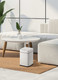 EK9208RPW10 - EKO Echo Touch-Free Sensor Bin - 10 Ltr - White - Placed in Living Room Next to Cream Sofa