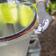 A User Wearing Gloves & Hi-Vis Vest Pulls at Bungee Cord