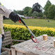 Safe Pick Pro Litter Picker Being Used to Collect Rubbish from a Picnic Table