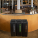 Three Rubbermaid Sustain Recycling Bins Situated in a Coffee Shop