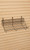 Black 24 x 12 x 6 inch Downslope Grid Shelf on Maple Slatwall
