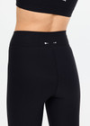 THE UPSIDE women's black Peached 25in Midi Pant is a mid-rise 7/8 length legwear made from recycled soft peached fabric with breathable and moisture-wicking fabrics.
