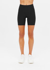 THE UPSIDE women's black Peached 6inch Pocket Spin Short is made from a breathable, moisture-wicking fabric with a brushed handfeel. The mid-rise short features 2 side pockets and a soft, supportive fit.