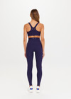 THE UPSIDE women's navy blue Peached 28inch High Rise Pant is a sustainable 28inch full length legging in our recycled soft peached fabric with a V shaped high-rise waistband.