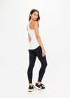 THE UPSIDE women’s white Frankie Rib Tank made with organic cotton elastane rib fabric features a racer back and scooped hems; ideal for yoga, pilates or barre.