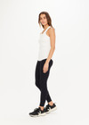 THE UPSIDE women’s white Frankie Rib Tank made with organic cotton elastane rib fabric features a racer back and scooped hems; ideal for yoga, pilates or barre.