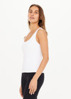THE UPSIDE women's white Balance Seamless Lenny Tank made with Form Seamless fabric features a scoop neck, cross back straps, shelf bra and removable cups.
