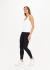 THE UPSIDE women's white Balance Seamless Lenny Tank made with Form Seamless fabric features a scoop neck, cross back straps, shelf bra and removable cups.