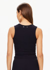 THE UPSIDE women's black Onyx Kori Crop Tank is made from recycled soft peached fabric with a brushed handfeel and moisture-wicking, breathable and quick-drying properties. This full coverage cropped tank top features a scoop front and an internal shelf bra with removable cups.