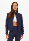 THE UPSIDE women's navy blue Margot Zip Jacket is made from soft suiting lenzing viscose. The slim fit, zip front jacket feature functional welt pockets at the front and a ribbed neckline, hem and cuffs.