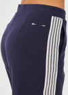 THE UPSIDE women's navy blue Petra Flare is made from lenzing viscose soft suiting fabric. The full length, soft tailored pant feature side seam pockets and a soft elasticated waistband.