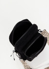 THE UPSIDE women's black Journey Crossbody Bag is made from corduroy fabric. This compact bag features a front zip pocket, larger zipper compartment with paracord zip pullers and adjustable, removable strap.