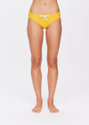 THE UPSIDE women's yellow marigold Dunes Olympia Pant is made from recycled textured rib fabric with moisture wicking properties. The low waisted, classic sporty swim bottom features an elasticated drawcord waist.