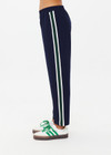 THE UPSIDE women's navy Mansi Paxton Tapered pant is made in recycled fabric to create a slim and lightweight effect. The tapered pant is water resistant and fitted with an elasticated waistband and front pockets. Designed for golf.