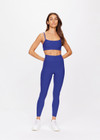 THE UPSIDE women's blue Carnaby 25 inch Midi Pant is made from a soft recycled ribbed fabrication. This mid rise legging features a soft folded waistband and is designed for yoga, pilates and barre.
