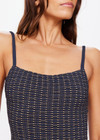 THE UPSIDE women's navy Caleta Lara Onepiece is made from specialty fabric with gold lurex and features a square neckline with scoop back, rouleau straps and is unlined.
