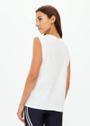 THE UPSIDE women's creme Estelle Tank is made from organic cotton. The relaxed muscle tank features a rib neckline and mesh embroidery. Designed to wear with your essentials.