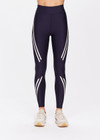 THE UPSIDE women's navy Cordoba 25 inch Midi Pant is made from a eco tech performance fabric making the pant breathable and quick drying. The mid rise pant features a printed white stripe down the leg creating a sporty chic look. Designed for the gym and running.