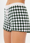 THE UPSIDE women's Portobello Malik Crochet Short is hand crocheted in a two tone design of green and white. The relaxed elasticated waist short is fitted with a white waistband with drawcord. Designed for activity golf.
