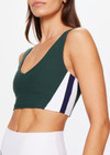 THE UPSIDE women's green Playoff Issac V Neck Bra is made from a recycled soft peached fabrication with a brushed handfeel creating a breathable and quick drying effect. The sports bra features a V neckline and removable bust cups for comfort and style. Designed for golf.
