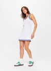THE UPSIDE women's white Elsa Crochet Mini Dress is hand crocheted in organic cotton. The mini dress features a scoop neck and high back with sky blue detailing framed in navy. Designed for leisure and recovery.