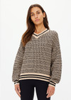 THE UPSIDE women's neutral abstract print Castilla Millie Knit Sweater is made with an organic cotton blend knit jacquard. This relaxed knitted sweater features a high neckline with striped rib. Designed for everyday wear.